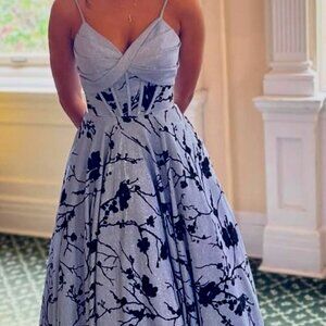 Camille la Vie Strap-sleeve Long A- Line Size 2 Blue Gown with Black Rose Patter